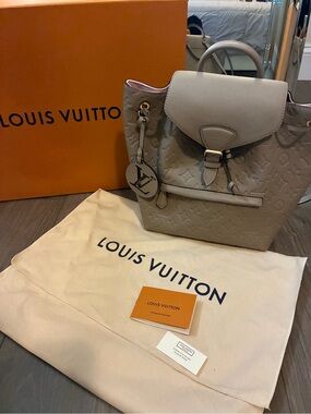 Authentic Louis Vuitton Montsouris PM Backpack Monogram Empreinte Turtledove